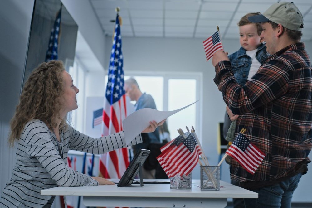 photo of person filling out a ballot